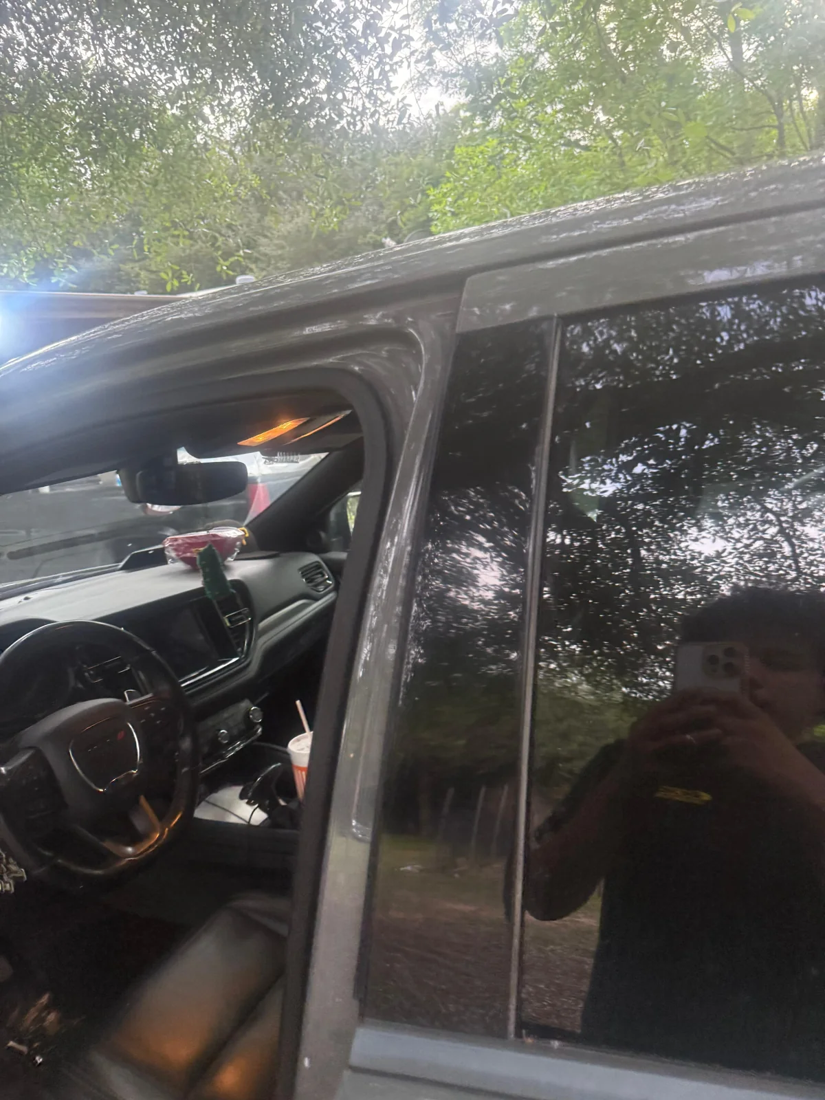 vehicle key fob checked beside a car, real company service photo 3