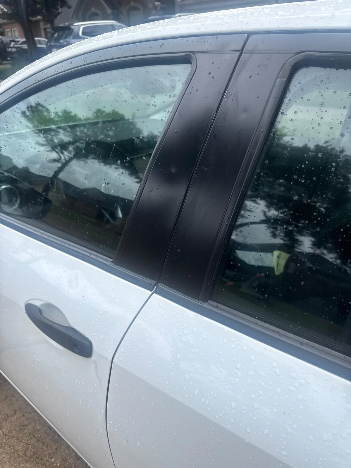 vehicle key fob checked beside a car, real company service photo 4